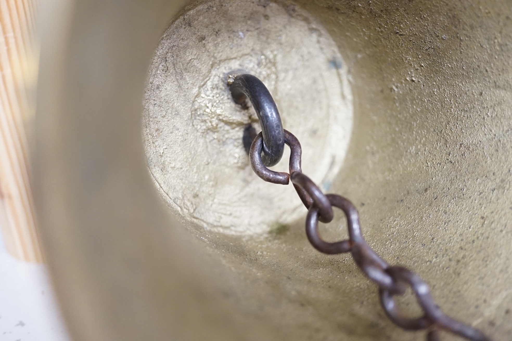 A late 19th/early 20th century brass school bell, with a turned mahogany handle, bell diameter 12.5cm, height 26cm. Condition - fair to good.